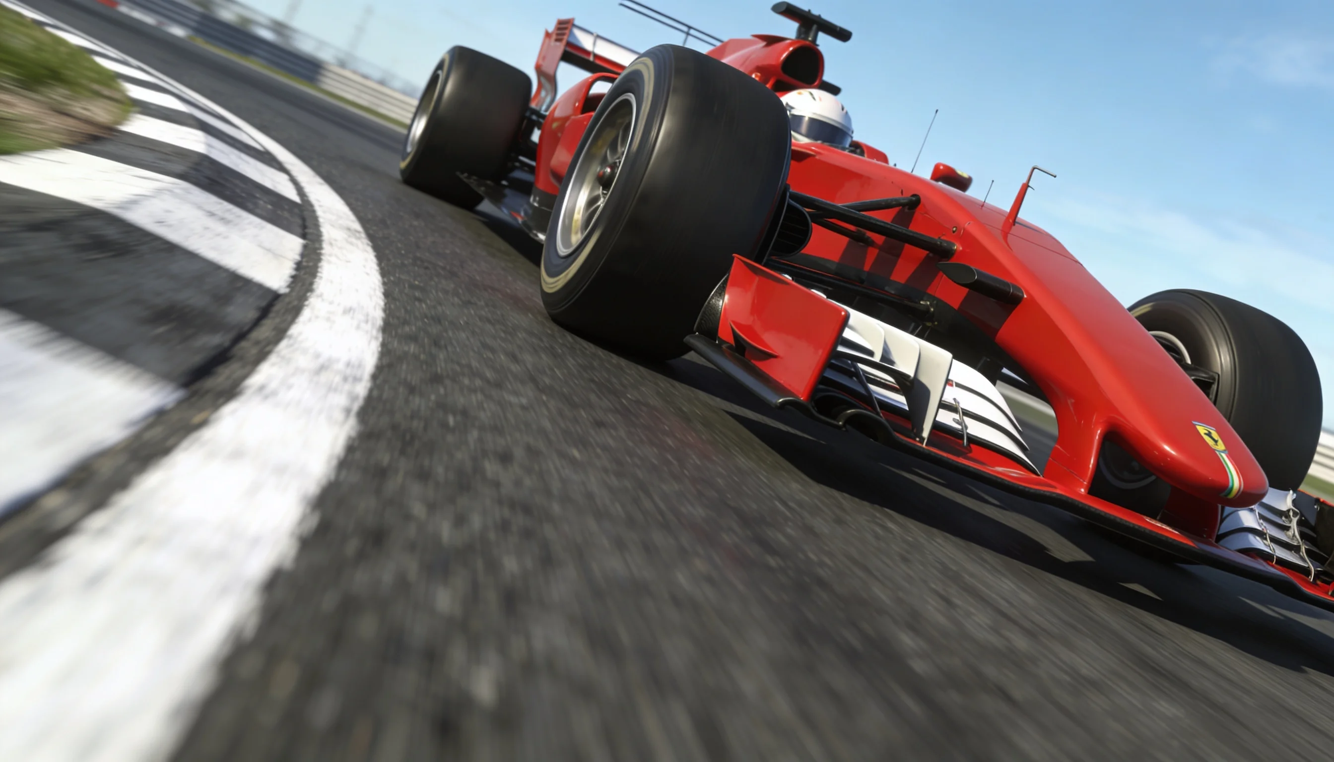 Monoposto di Formula 1 di colore rosso in azione su un circuito